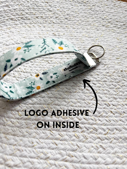 White Floral On Pink Key Fob