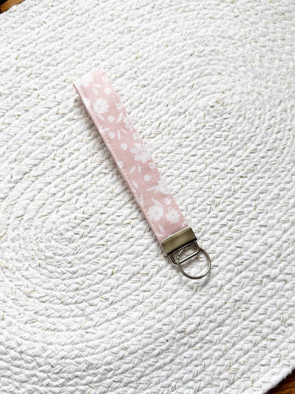 White Floral On Pink Key Fob